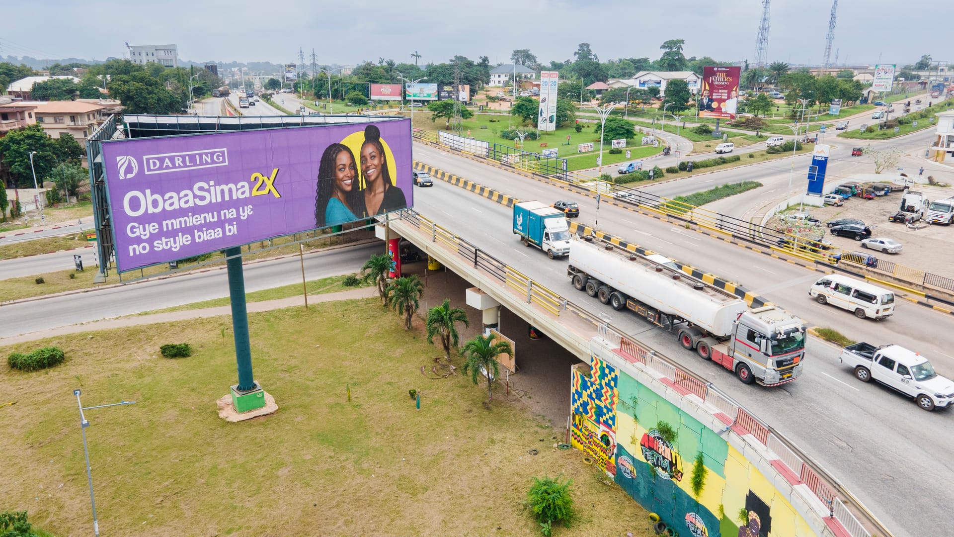 XMINGER roadside billboard campaign in Ghana, scene 2
